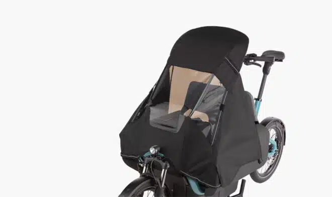 G-Passion à Genval ebike Riese & Müller carrie vario aqua capote enfant