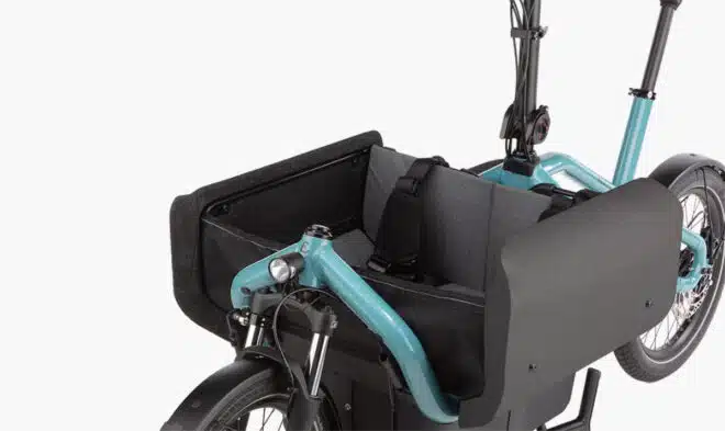 G-Passion à Genval ebike Riese & Müller carrie vario aqua siège enfant