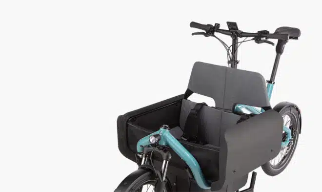 G-Passion à Genval ebike Riese & Müller carrie vario aqua siege enfant appuie tête